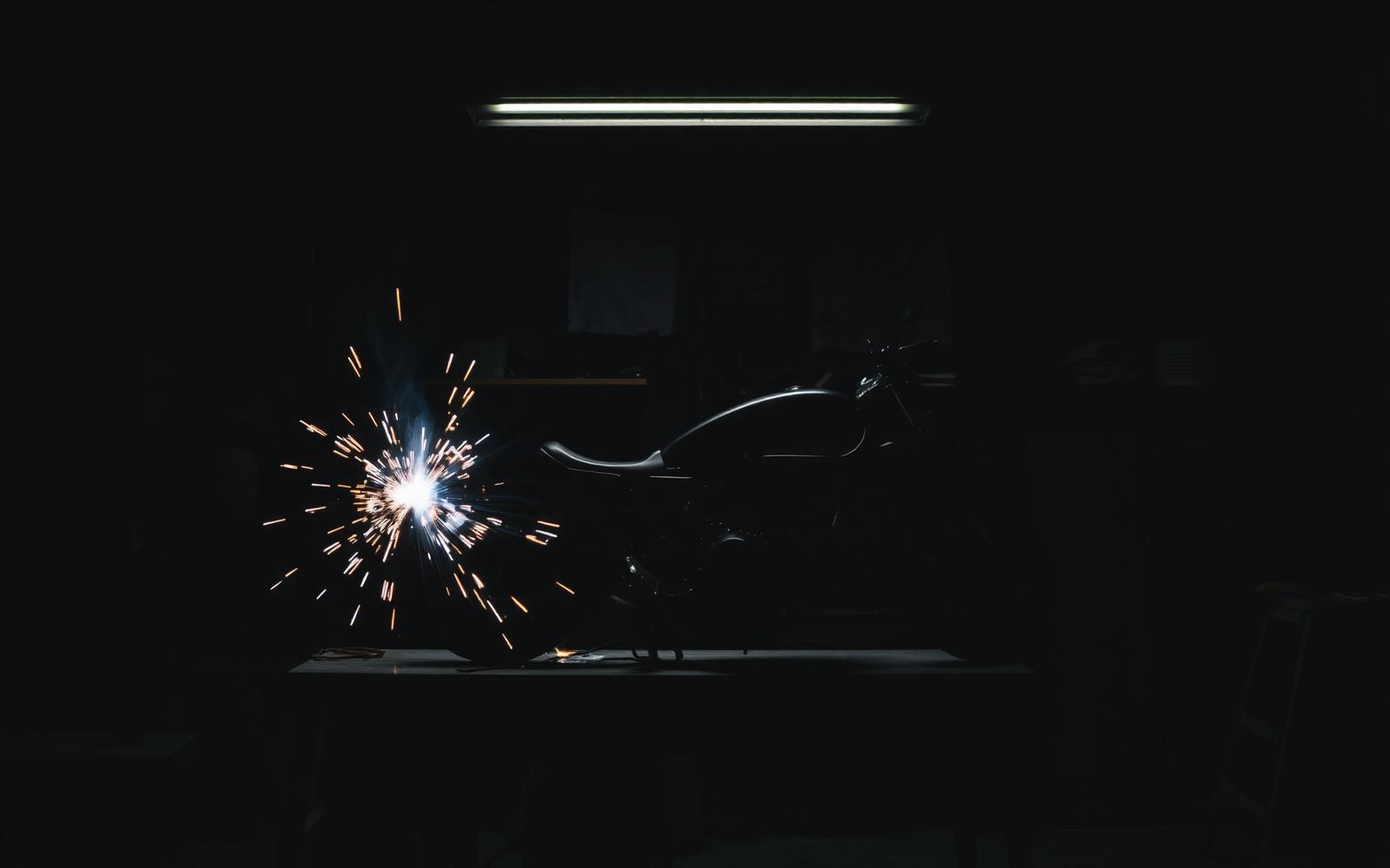 Fabrication work in a dark garage